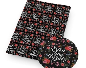 May include: Black fabric with a floral pattern and the text "Eat a bag of Dicks" in white. The design includes red and pink flowers, green leaves, and small white stars.