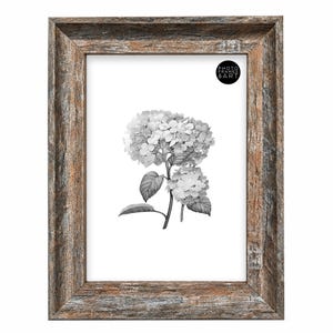 May include: A rectangular picture frame with a weathered brown wood grain finish containing a black and white botanical illustration of hydrangea flowers. A circular black logo with the white text PHOTO FRAMES & ART is in the top right corner.