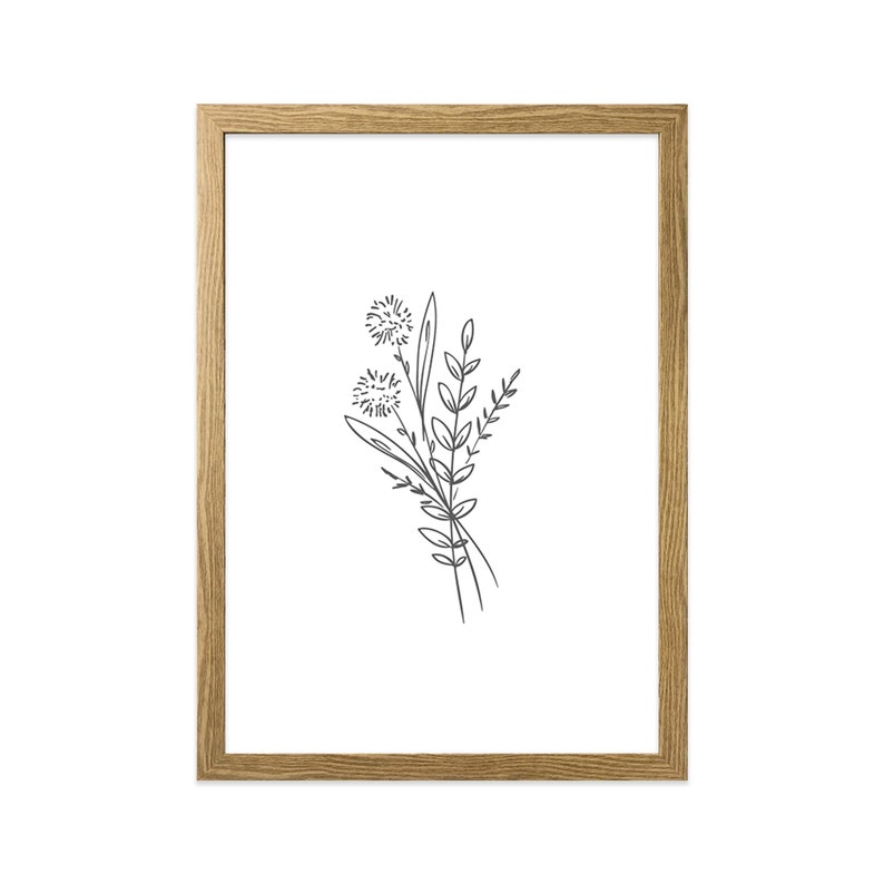 May include: A framed black and white line drawing of a bouquet of wildflowers. The drawing is simple and elegant, with delicate lines and a minimalist aesthetic.