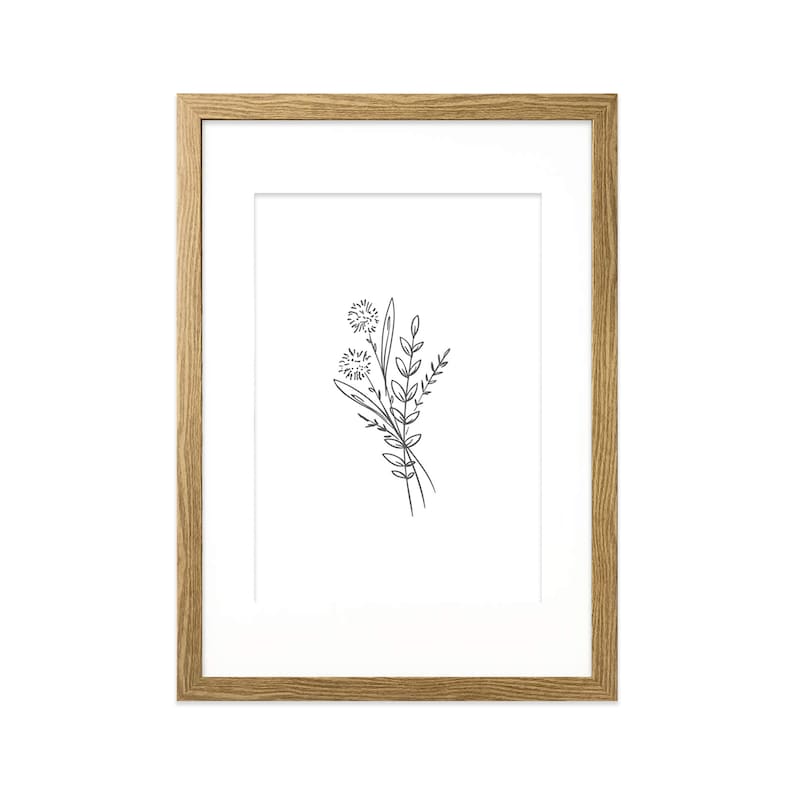 May include: A framed black and white line drawing of a bouquet of flowers with three flower heads and leaves.