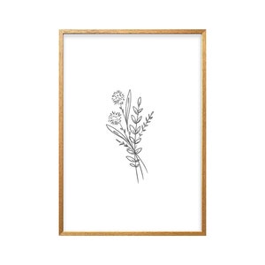 May include: A framed print with a simple line drawing of a bouquet of flowers in black and white. The frame is a light wood color.