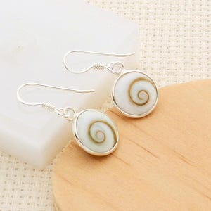 Eye of Saint Lucia earrings in silver