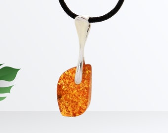 Amber and silver pendant