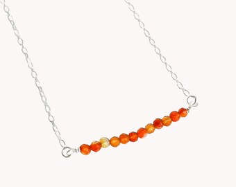 Fine necklace in silver and faceted Carnelian stones