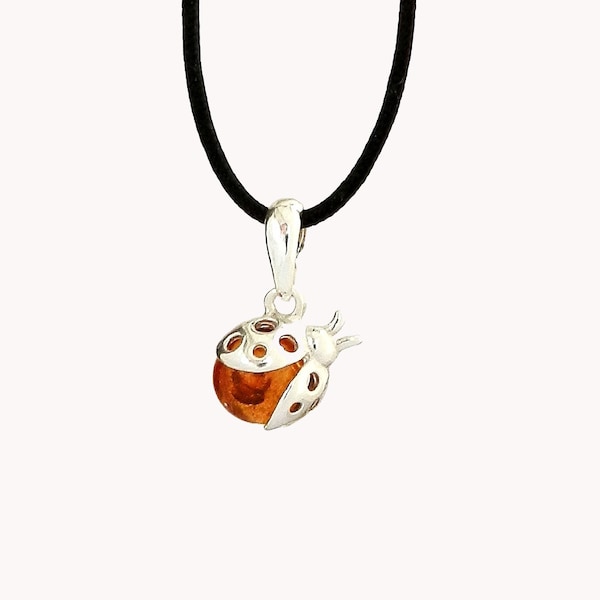 Pendentif coccinelle en ambre et argent