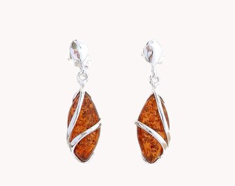 Red amber earrings on silver