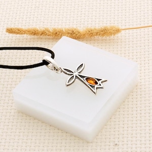Celtic-inspired cross pendant in amber and silver