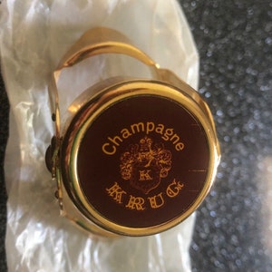1 X Bouchon De Bouteille KRUG Champagne GOLDEN TONE Inutilisé Neuf dans un sac