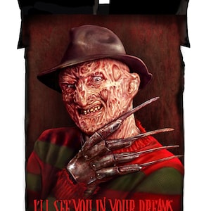 May include: A black and red bedding set featuring a portrait of a horror movie character with a brown hat and a striped sweater. The character has a menacing expression and metal claws. The text "I'LL SEE YOU IN YOUR DREAMS" is at the bottom.