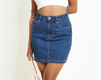 Minifalda vaquera de talle alto 100% algodón, lavado azul medio, estilo casual de verano.