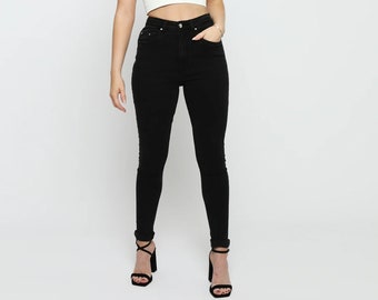 Pantalones vaqueros ajustados de talle alto para mujer en color negro: pantalones de mezclilla elástica de corte ajustado.