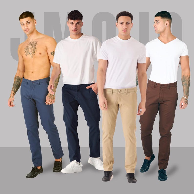 May include: Four men wearing various coloured trousers and white t-shirts. The trousers are blue, navy, khaki, and brown. One man is shirtless, while the others wear crew neck and v-neck t-shirts. The background is a plain grey.