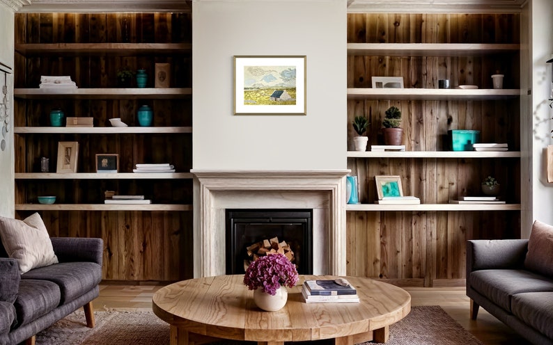 May include: A framed painting of a landscape with a blue sky, white clouds, and a field of yellow flowers. The painting is in a gold frame and is hanging on a white wall.