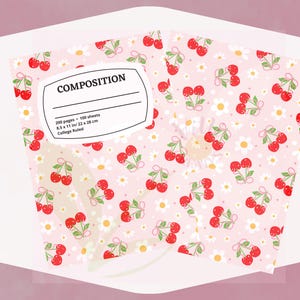 May include: A composition notebook with a light pink cover featuring a repeating pattern of red cherries and white daisies. The white label on the front reads COMPOSITION, 200 pages, 100 sheets, 8.5 x 11 in, 22 x 28 cm, and College Ruled.