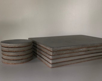 Set aus Tischsets und Untersetzern aus poliertem Beton