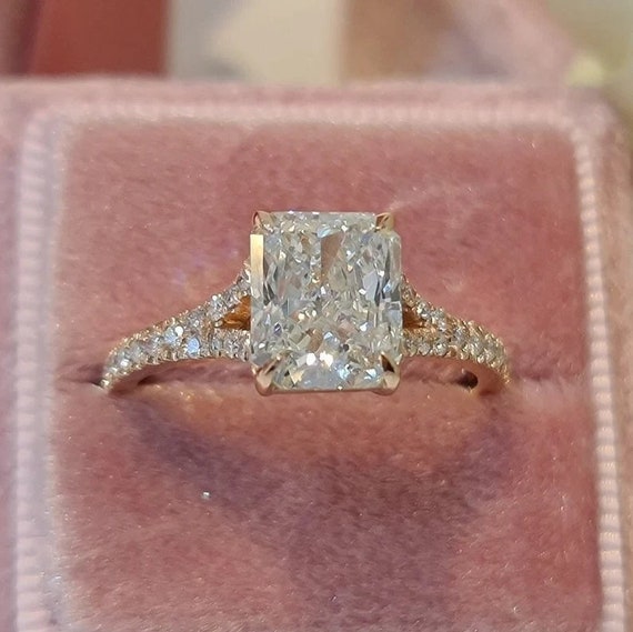 Elongated radiant clearance cut moissanite