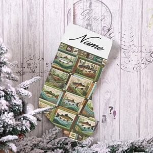 May include: A Christmas stocking with a white top and a patterned lower section. The pattern features various fish illustrations in a patchwork design with green, brown, and blue tones. The word "Name" is written in black script on the white top.
