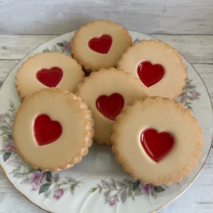 Faux Linzer Cookies with faux red jelly, fake valentines cookies,faux cookies, fake cookies, heart cookies