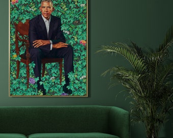 May include: A framed portrait of a man in a dark suit sitting on a wooden chair in a lush green garden setting. The man is surrounded by green leaves and flowers.