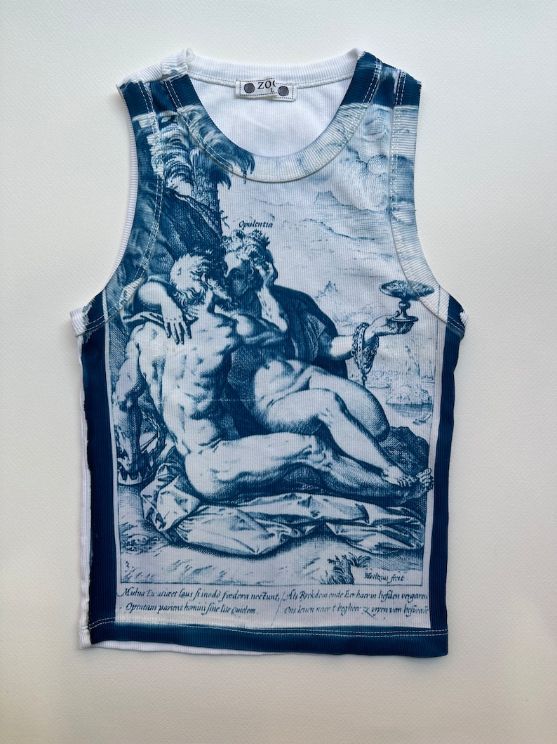 May include: White sleeveless tank top with a blue and white print of a Renaissance-era painting depicting a reclining couple. The print includes the text "Mutua Du wiret laus fi inodd fredera no&eacute;tunt, Ats Prikdom ente Eor haeren liefden vergan Oprutam parient homini fine lite Quidem. Ces down art begher".