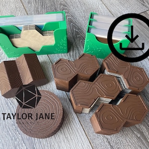 May include: Two bright green plastic card holders containing decks of cards, accompanied by several brown, wood-textured, hexagonal and rectangular game components with topographic patterns, and a circular brown wood-grain token.