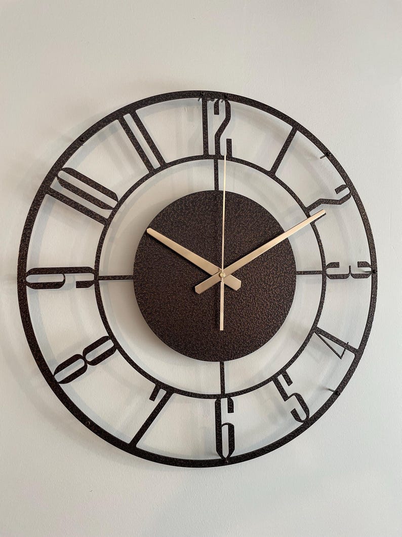 Silent ticking bronze wall clock