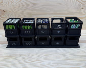 Premium battery organizer with labeling, modular, stackable for AA, AAA, 9V batteries, button-operated, leak-proof, 18 colors, 3D printed from PLA, organizational system