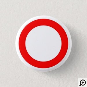 May include: A circular white badge featuring a bold red ring encircling a white central area. The design is minimalist and striking, likely intended for use as a pin or button.