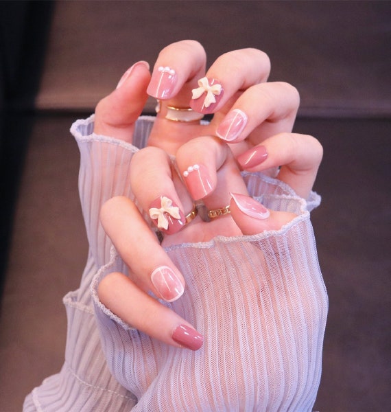 CUTE Multicolor Peach Marble With Pearls Bow Tie Press on Nails