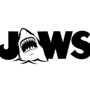 May include: Black and white graphic of the word "JAWS" with a shark emerging from the water. The shark's open mouth reveals sharp teeth. The letters are bold and in a sans-serif font.