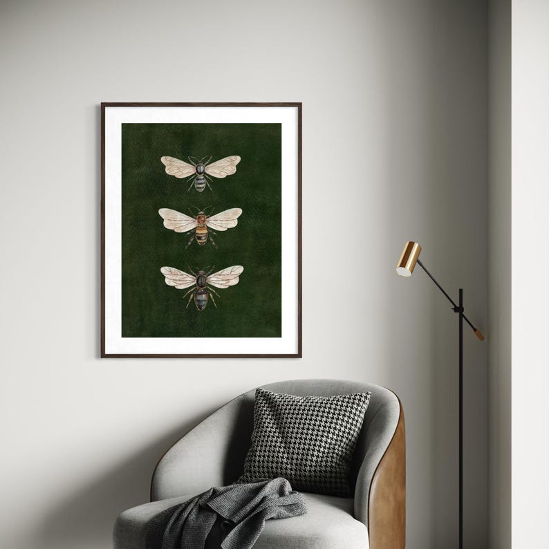 May include: A framed wall art print featuring three detailed illustrations of bees arranged vertically. Each bee is depicted with translucent wings and distinct body markings against a solid, deep forest green background.