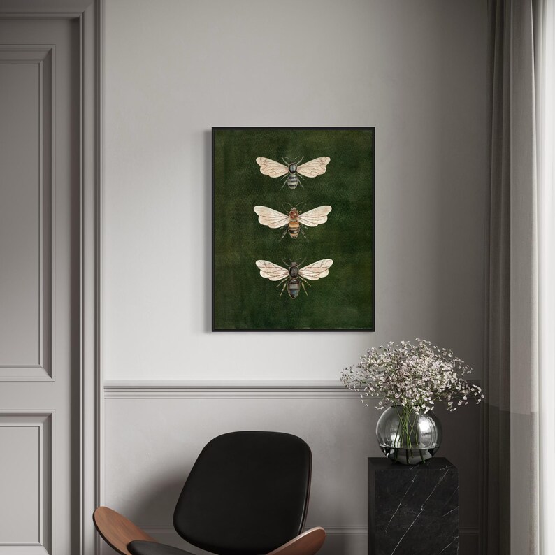 May include: A framed wall art print featuring three detailed illustrations of bees arranged vertically. Each bee is depicted with translucent wings and distinct body markings against a solid, dark forest green textured background.