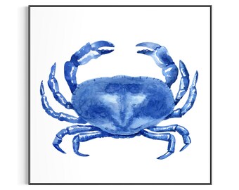 May include: A framed watercolor print of a blue crab. The crab is painted in shades of blue, with a detailed depiction of its claws, legs, and body. The artwork is set against a white background, creating a striking contrast.