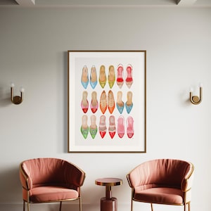 Op de afbeelding: Een ingelijst aquarel schilderij van 18 kleurrijke damesschoenen. De schoenen zijn allemaal in verschillende stijlen, waaronder platte schoenen, hakken en sandalen. De schoenen zijn gerangschikt in een rasterpatroon op een witte achtergrond.