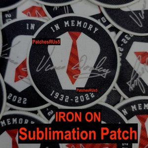 May include: A white and black iron-on sublimation patch with a red tie design. The patch says "In Memory" and has the years "1932-2022" printed on it. The text "IRON ON Sublimation Patch" is printed in red below the patch.