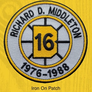 May include: Embroidered iron-on patch with a yellow, white, and black design. The patch features the name "RICHARD D. MIDDLETON" around the outer edge, with the number "16" in a yellow square at the center. The years "1976-1988" are displayed below. The text "Iron On Patch" is at the bottom.