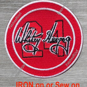 May include: Red and white embroidered patch with the number 24 and the name "Whitley Merman" in black cursive lettering. The patch is circular and has a white border. The text "IRON on or Sew on" is printed below the patch.