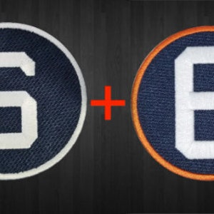 May include: Two blue and white embroidered patches with the number "6" in white on a blue background. One patch has an orange border.