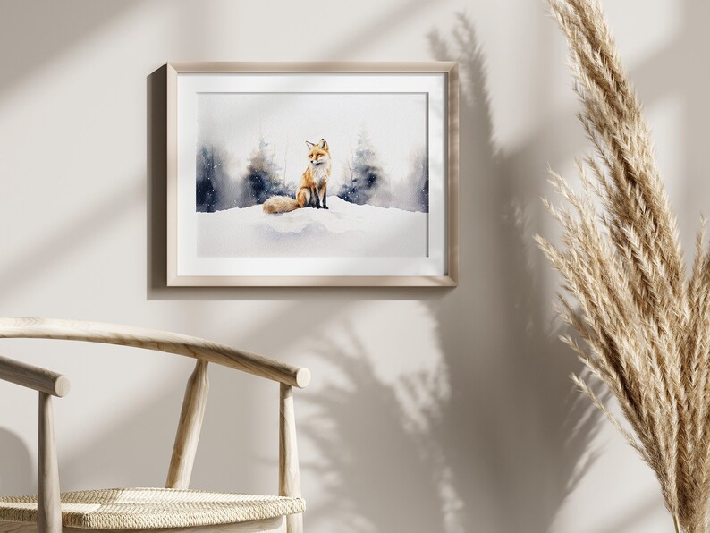 May include: A watercolor painting of a red fox sitting in a snowy forest. The fox is looking to the right, and the background is a soft blue and white.