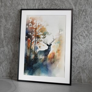 May include: A watercolor painting of a deer standing in a forest. The deer is silhouetted against a background of trees and foliage. The colors are muted and blend together, creating a sense of depth and atmosphere.