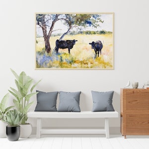 May include: Watercolour painting of two black cows standing in a field with a tree in the background. The cows are facing each other and the tree is in the top left corner of the painting.