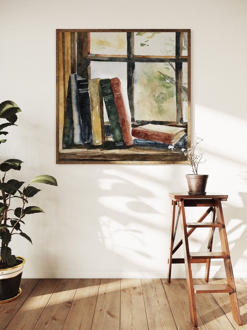 Puede incluir: Una pintura de acuarela de una ventana con una pila de libros en el alf&eacute;izar. La ventana est&aacute; enmarcada en madera y tiene una vista de un &aacute;rbol verde afuera. Los libros son de varios colores y tama&ntilde;os.
