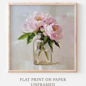 May include: A framed print featuring a still life of pink peonies in a clear glass vase. The artwork has a soft, painterly style with visible brushstrokes. The print is labeled "FLAT PRINT ON PAPER UNFRAMED."