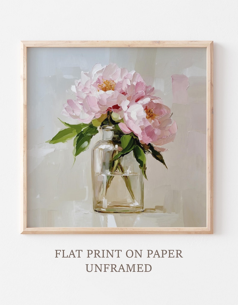 May include: A framed print featuring a still life of pink peonies in a clear glass vase. The artwork has a soft, painterly style with visible brushstrokes. The print is labeled "FLAT PRINT ON PAPER UNFRAMED."