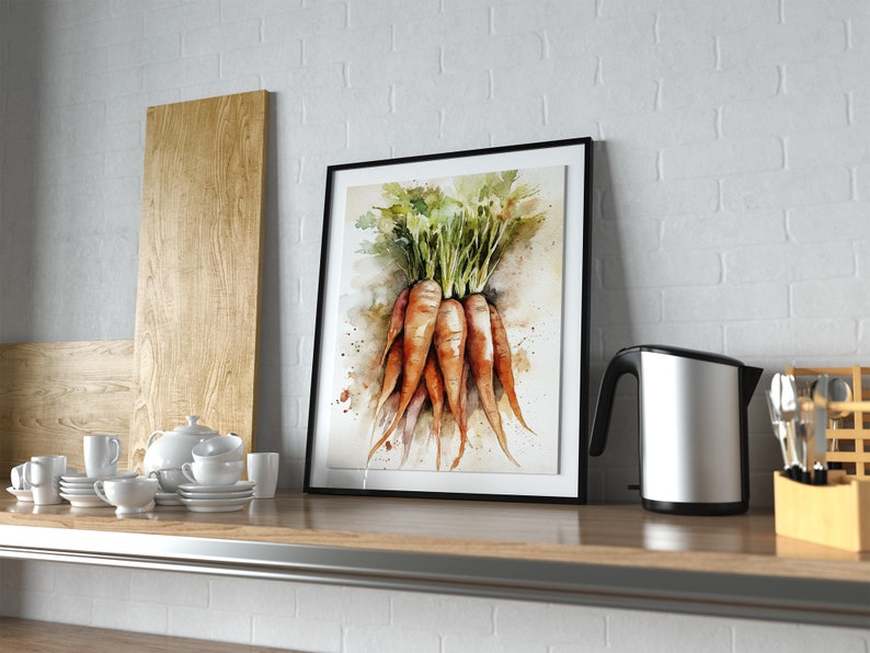 May include: A framed watercolor print of carrots with green tops. The artwork features orange carrots with green leaves, displayed in a black frame. The print is on a wooden shelf with a white brick wall background.