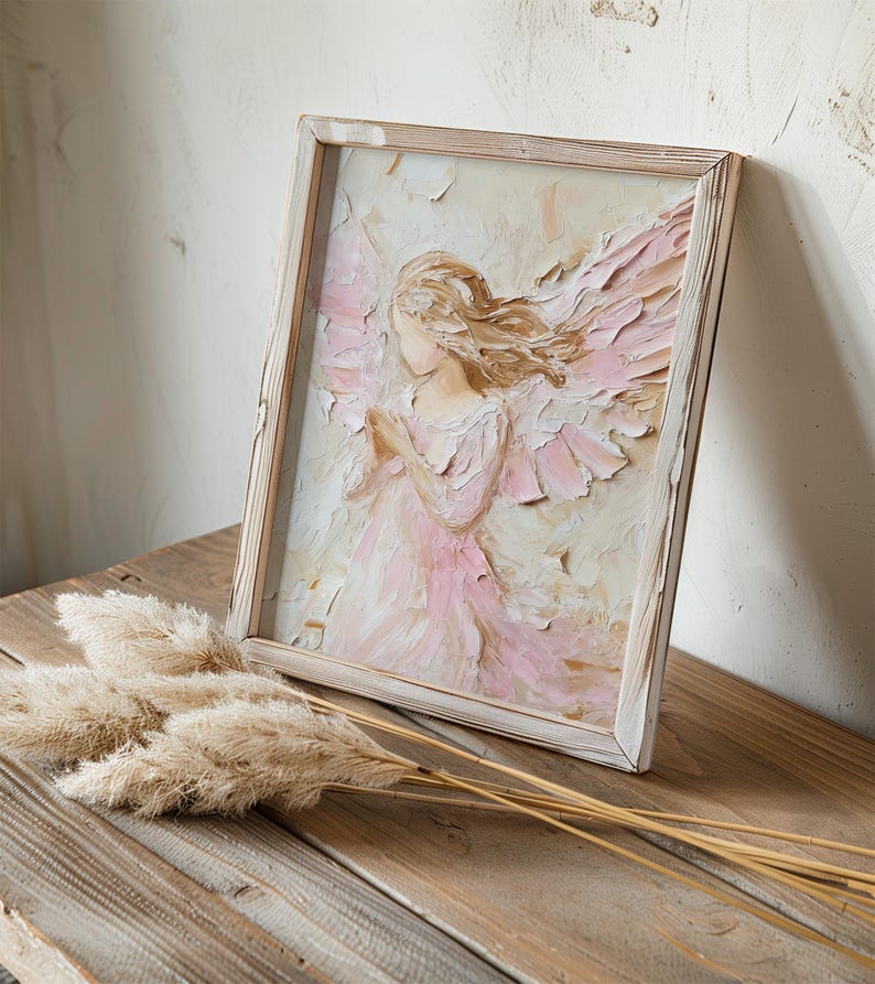 May include: A framed painting of an angel with pink wings and a white dress. The angel is painted in a textured style, giving the painting a three-dimensional look.