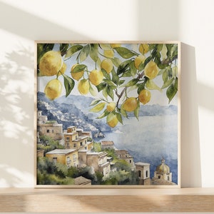 May include: Watercolor painting of a lemon tree with ripe yellow lemons hanging from the branches. The tree is situated on a hillside overlooking a blue ocean and a small town with yellow buildings.