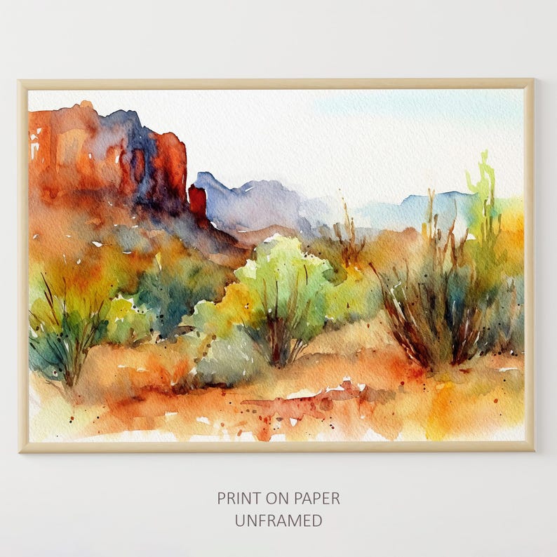 Puede incluir: Pintura acuarela de un paisaje des&eacute;rtico con formaciones rocosas rojas, arbustos verdes y un cielo naranja brillante.