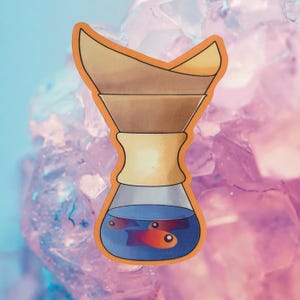 May include: A sticker of a glass coffee carafe with a brown filter and two orange fish swimming in the blue liquid inside.
