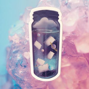 May include: A sticker featuring a jar filled with a galaxy scene. Inside the jar are floating white shapes, planets, and a purple and gold ringed planet. The jar has a dark purple lid and a cloud shape at the top.